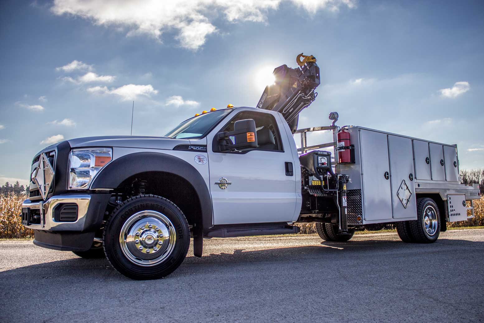 white truck side view with crane