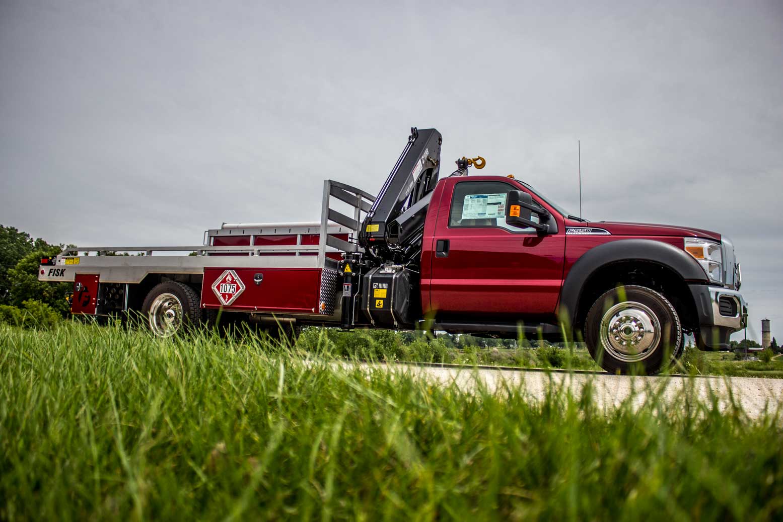 red truck with grass