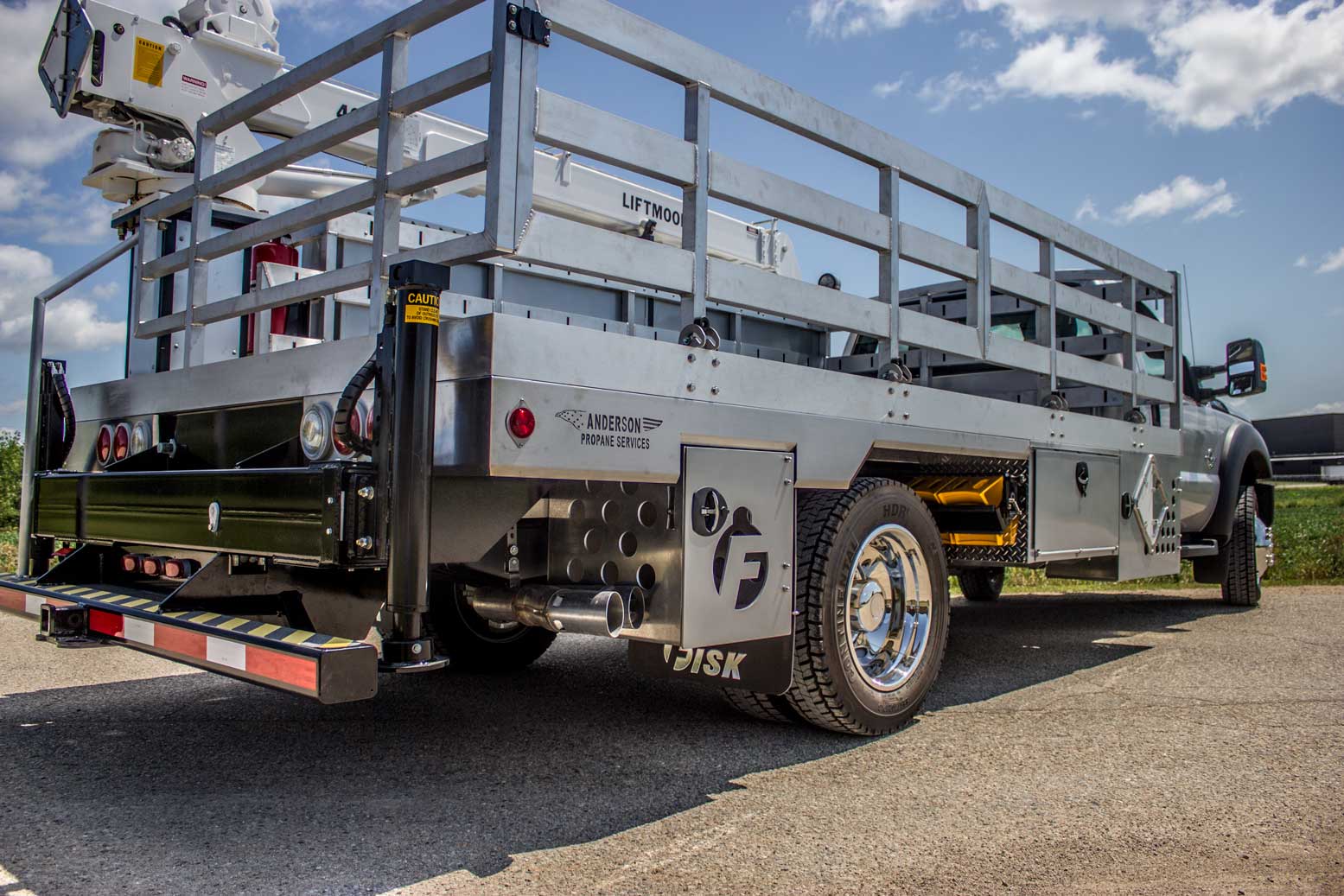 Right rear view of a propane stick boom truck