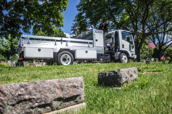 Service truck parked in a field