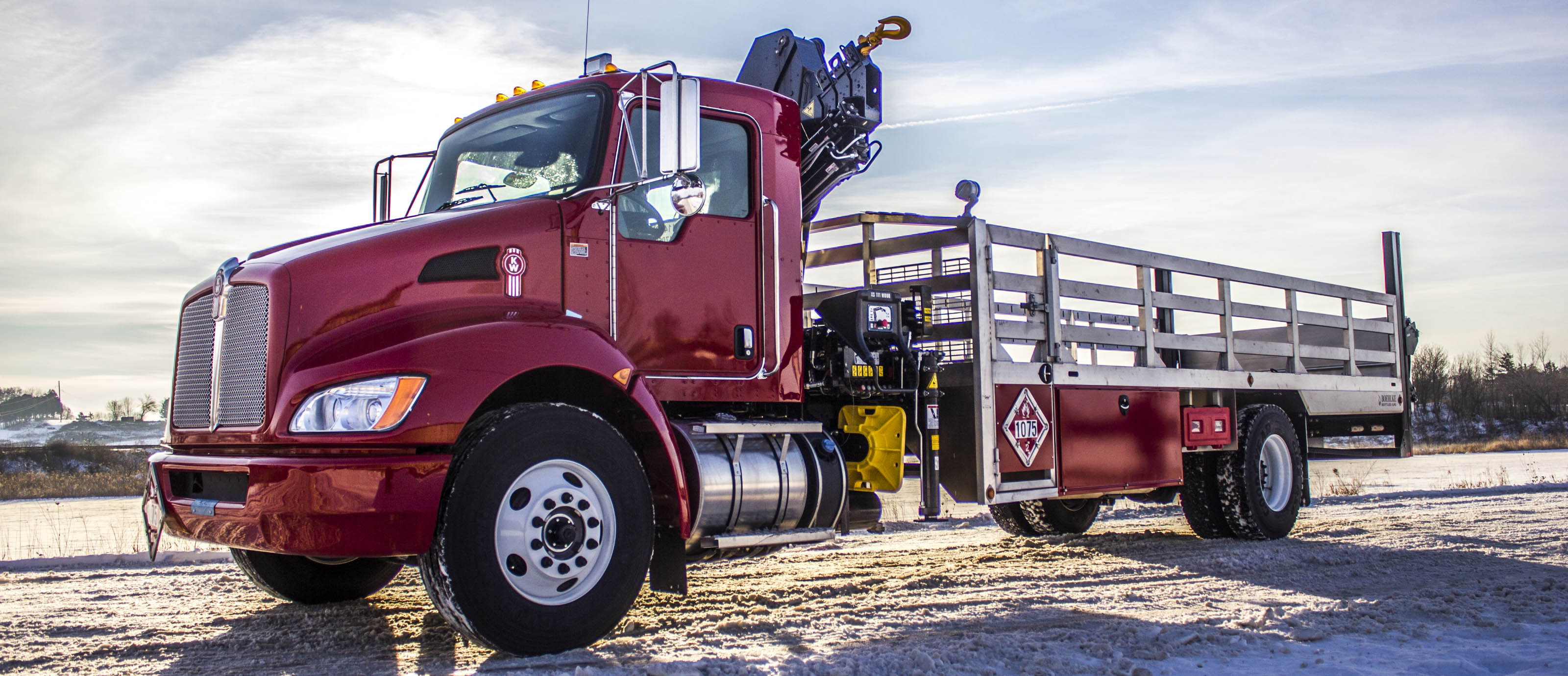 red truck knuckle boom