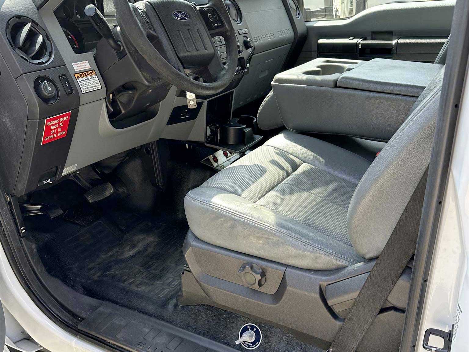 The interior of a white ford truck